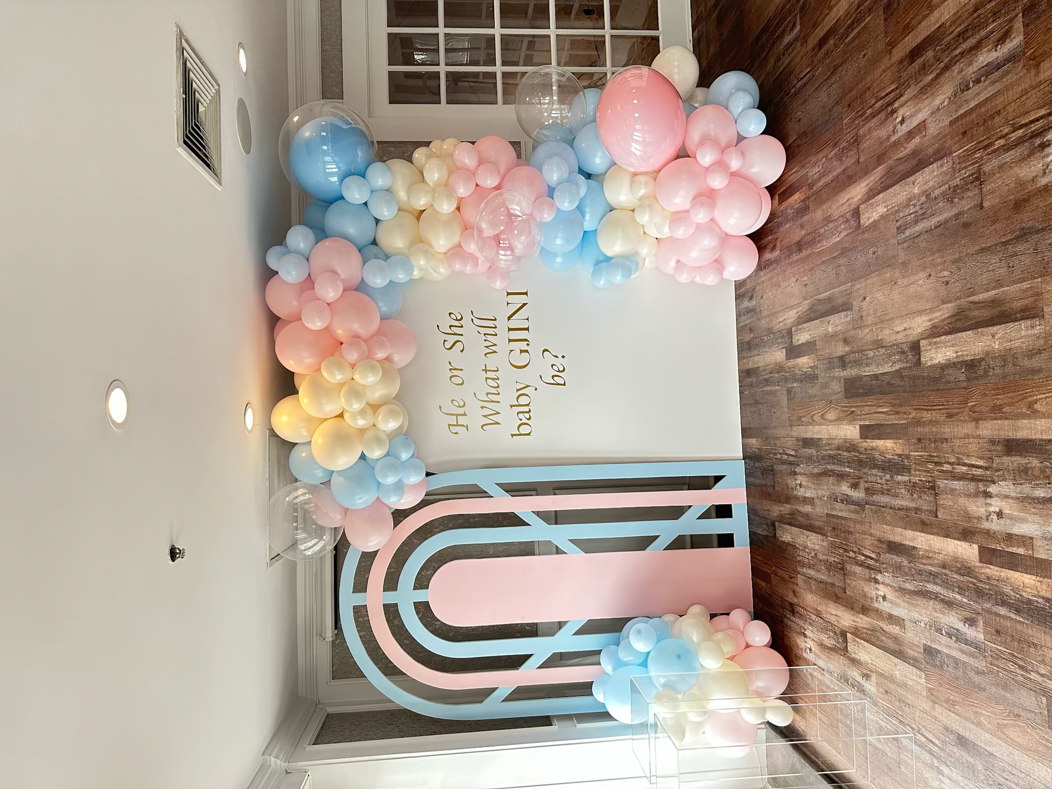 Gender reveal party rainbow balloon backdrop decoration